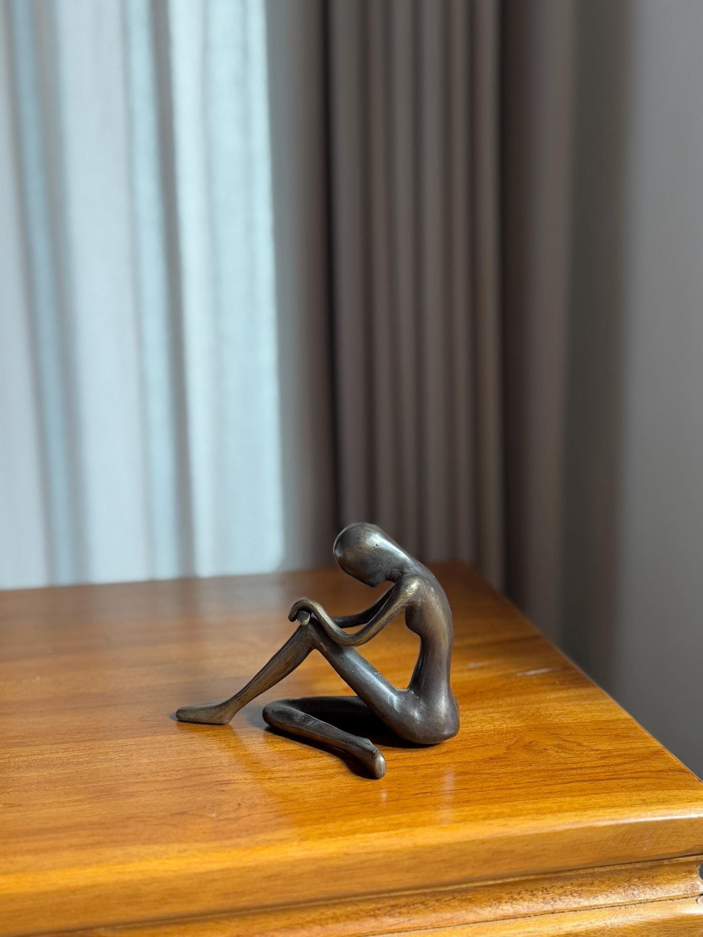 Minimalist Edge-Sitting Brass Sculpture