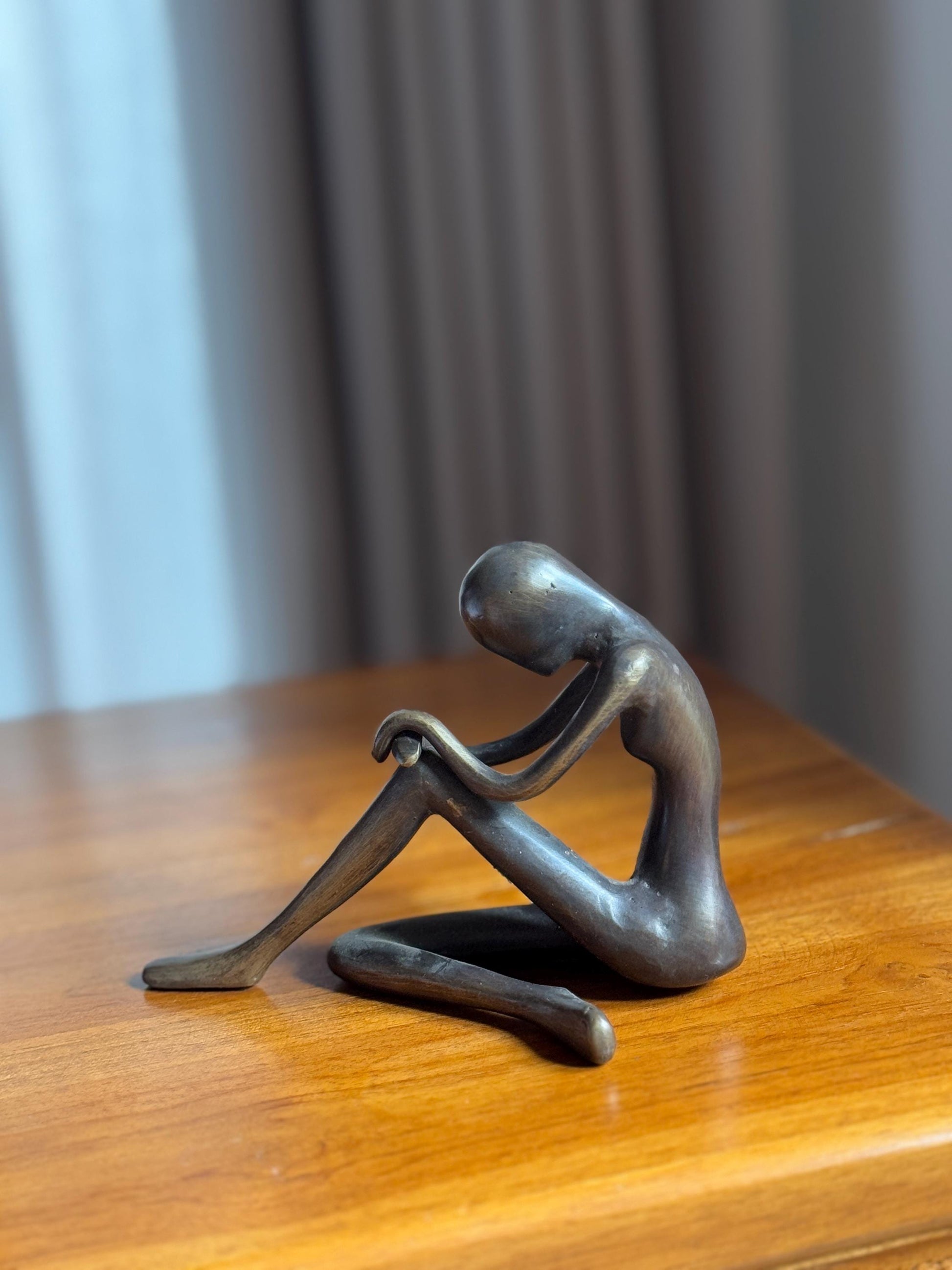 Minimalist Edge-Sitting Brass Sculpture