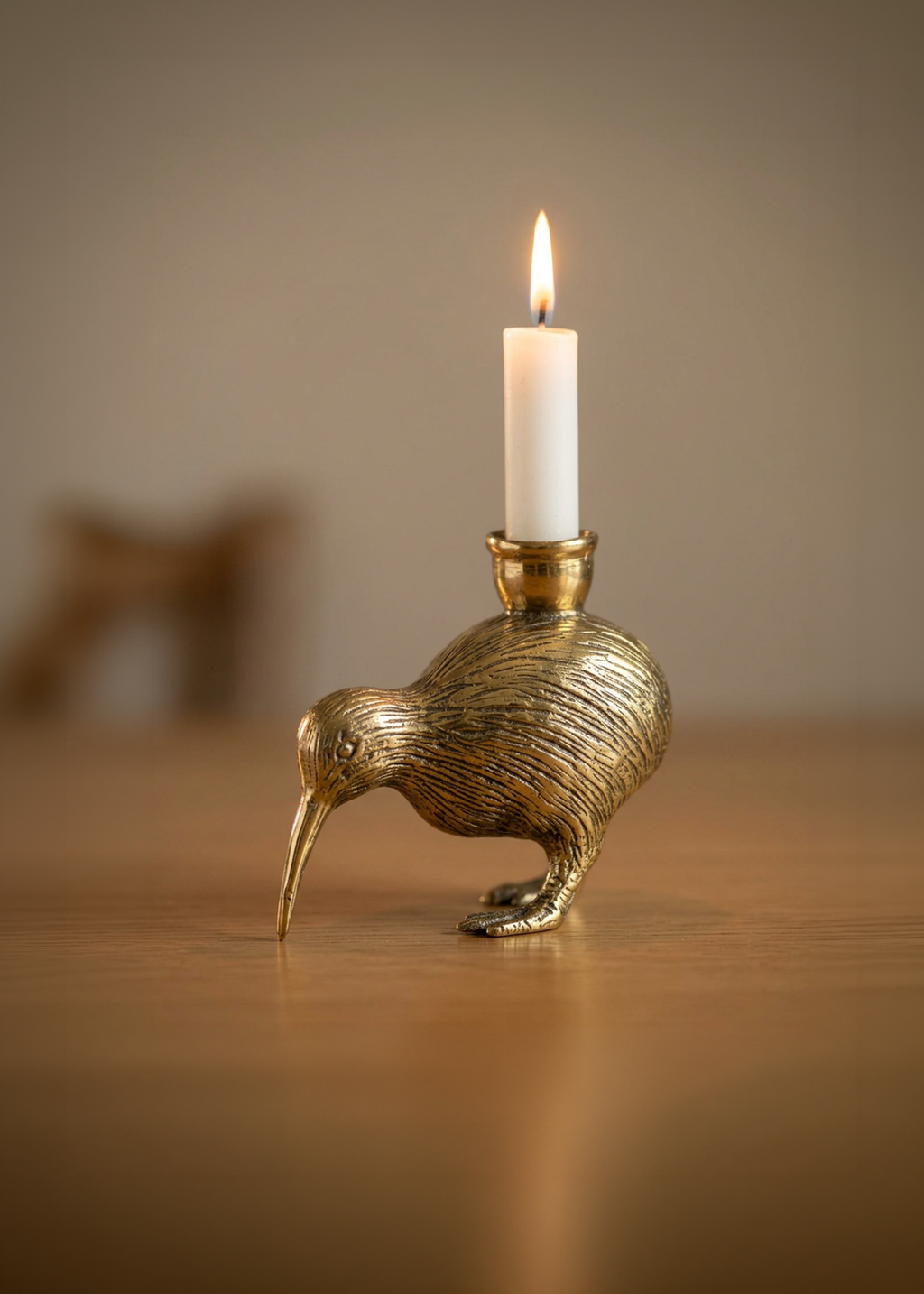 Vintage brass bird candleholder with sculptural kiwi figurine design