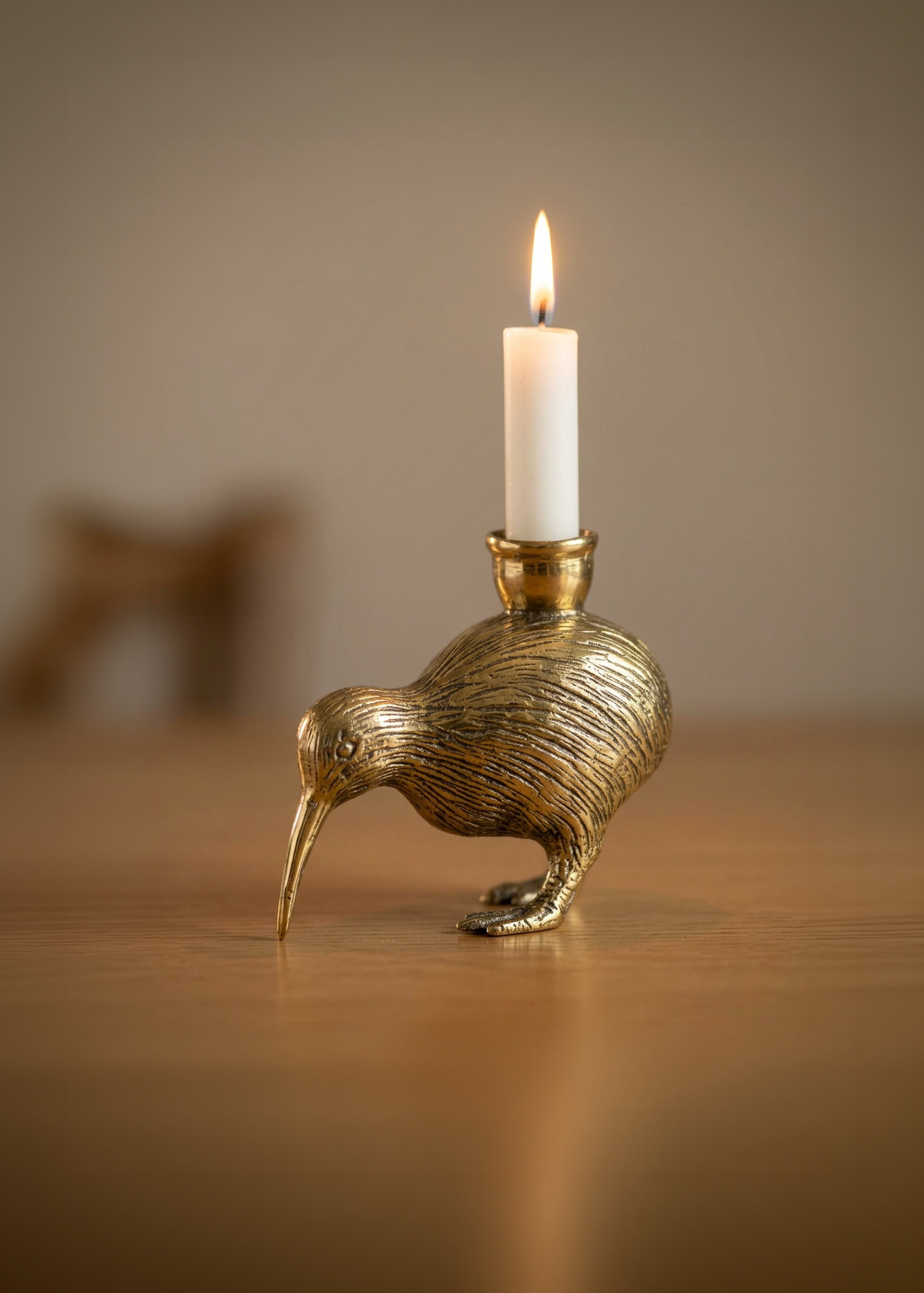 Vintage brass bird candleholder with sculptural kiwi figurine design