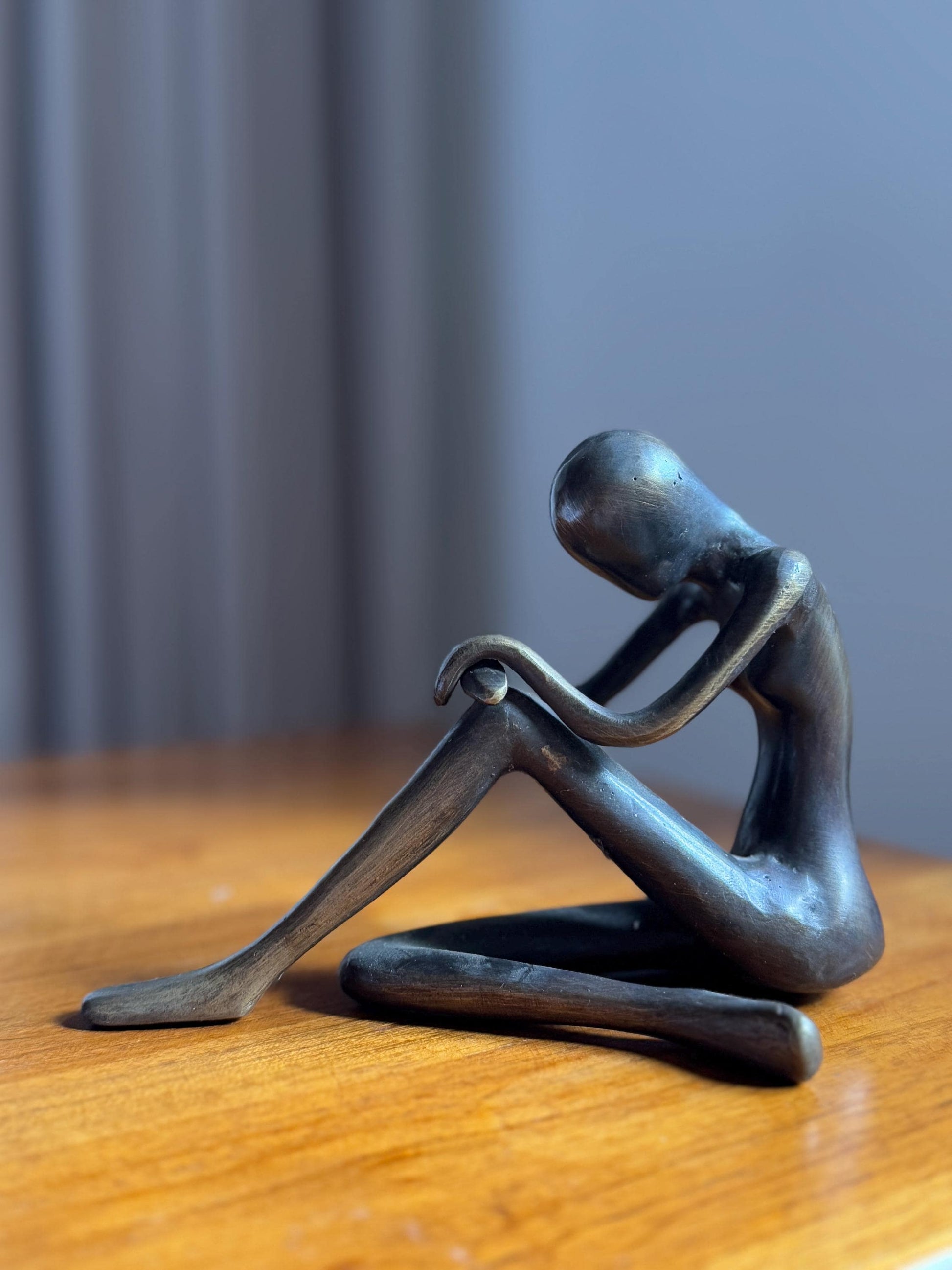 Minimalist Edge-Sitting Brass Sculpture