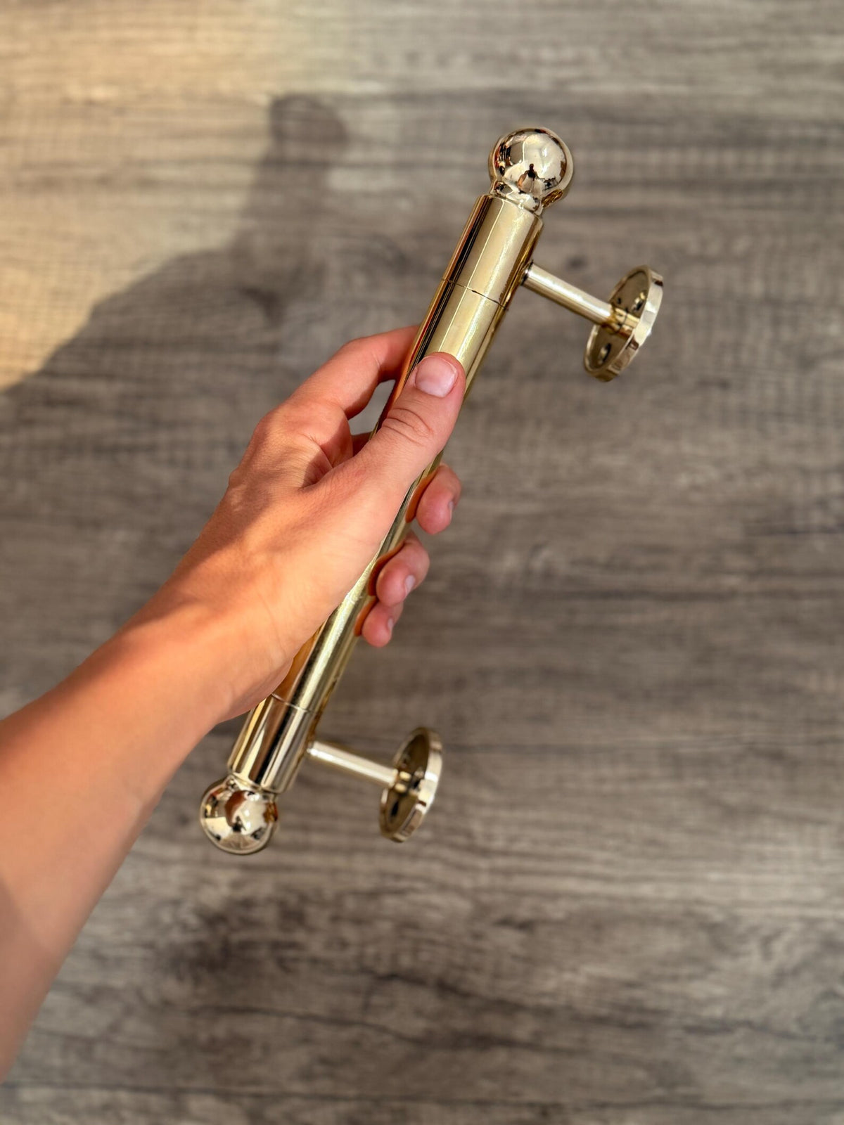Brass door pull handle with intricate handcrafted detailing