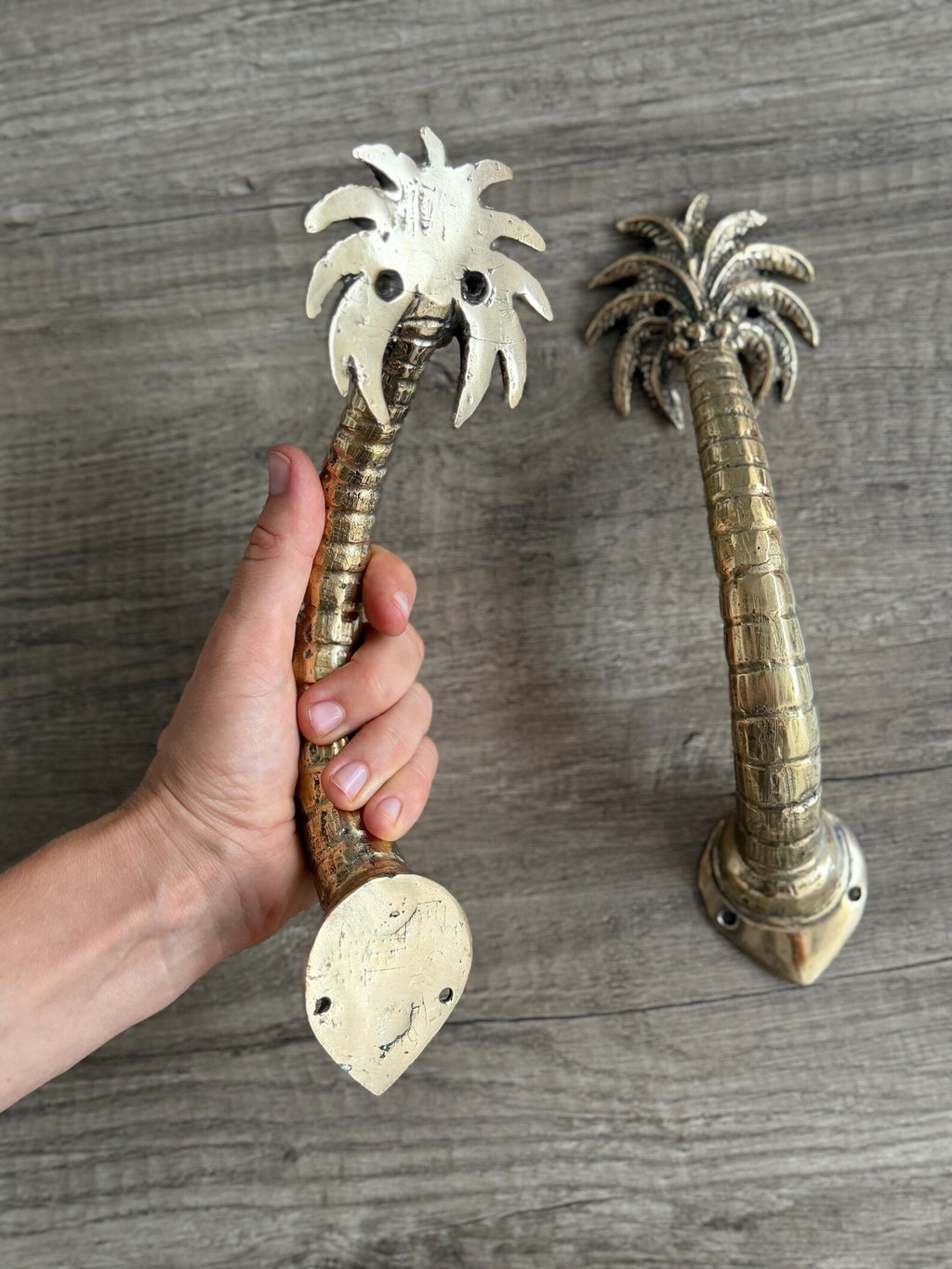 Sculptural brass palm hardware with relaxed luxury