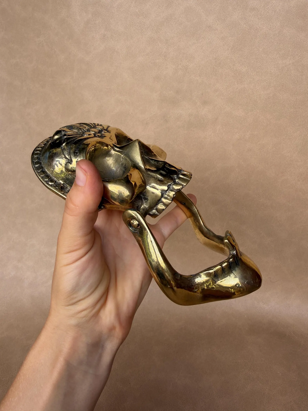 Gold skull knocker as a statement piece for front doors