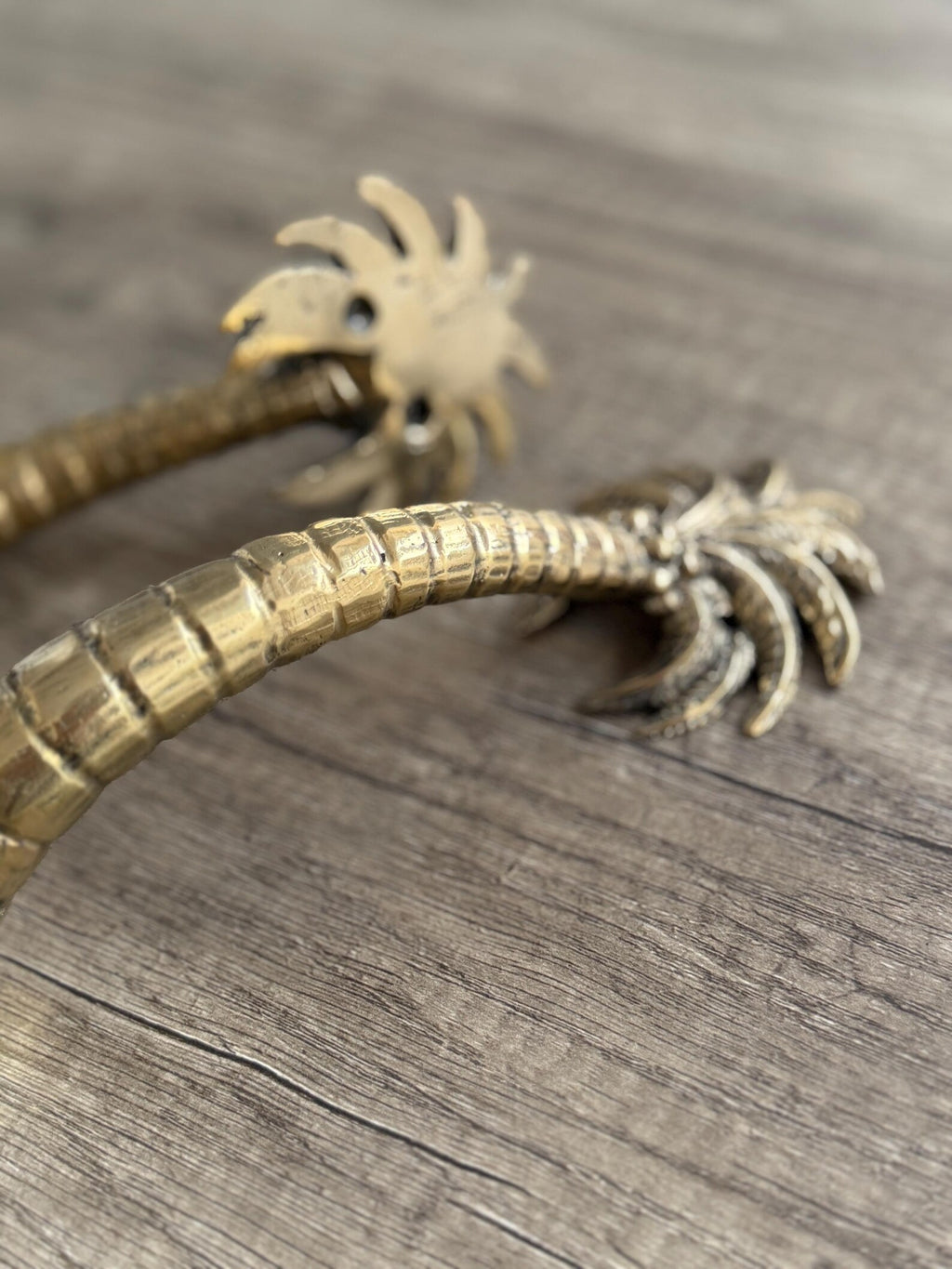Brass palm tree door handle with intricate handcrafted detailing